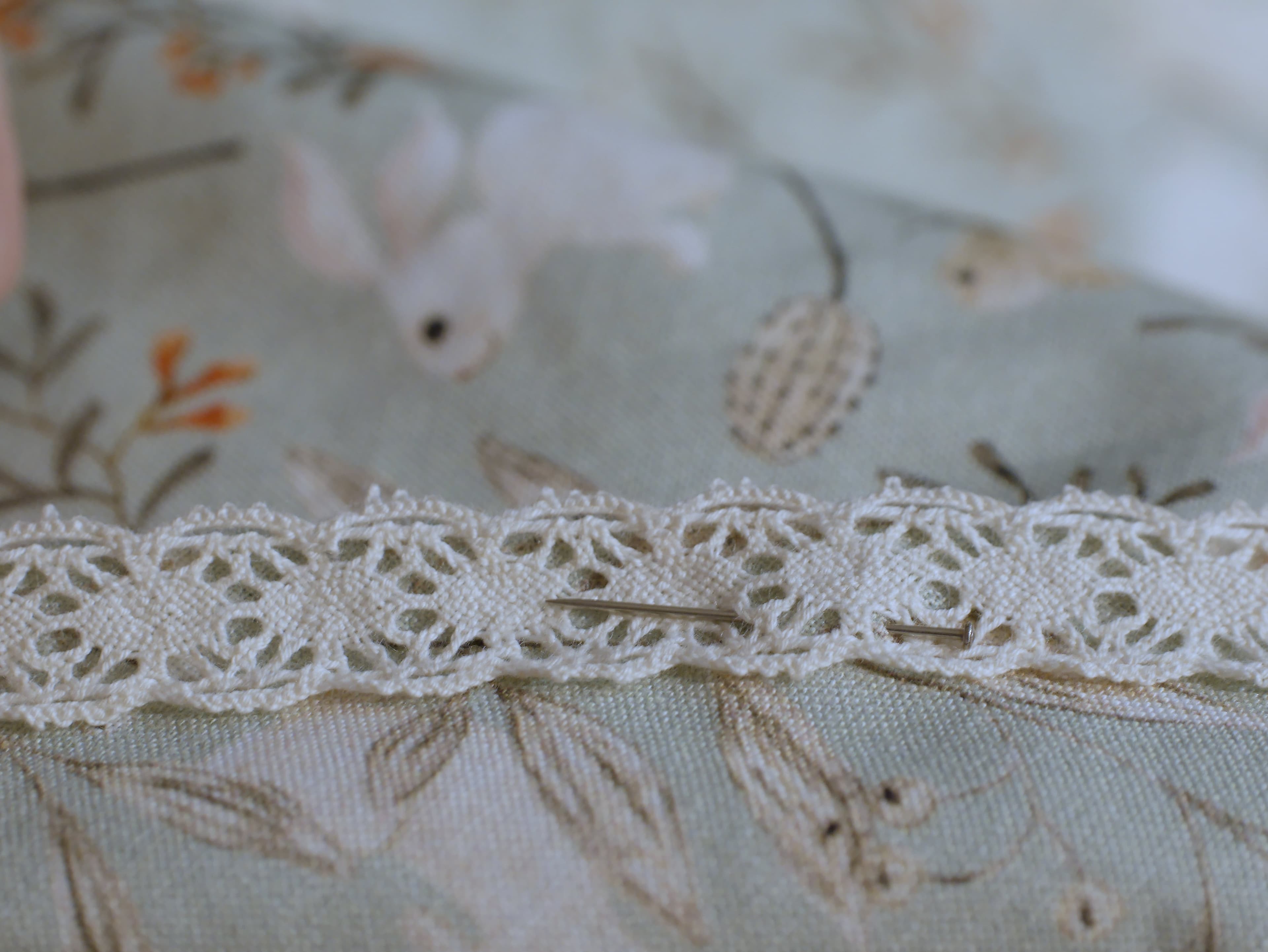 lace pinned onto skirt hem